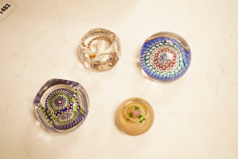 Three Whitefriars glass paperweights and a boxed St Louis sulphide paperweights, largest 7.5cm in diamter